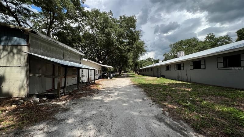 Back side lane between barn and office