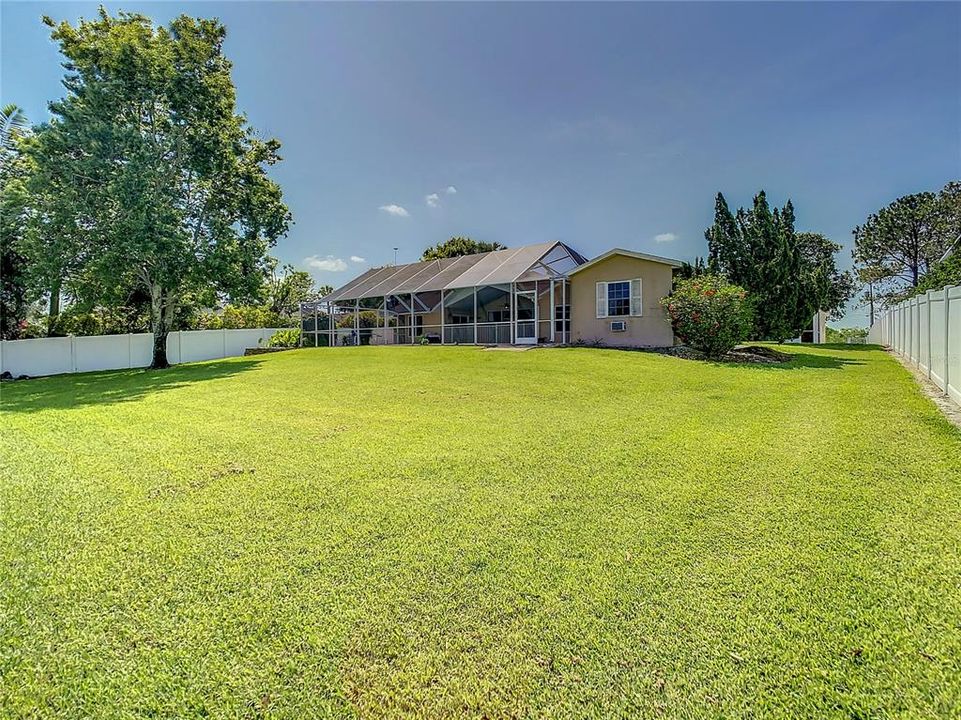 Enjoy the privacy of your back yard with vinyl privacy fencing on either side of the property.