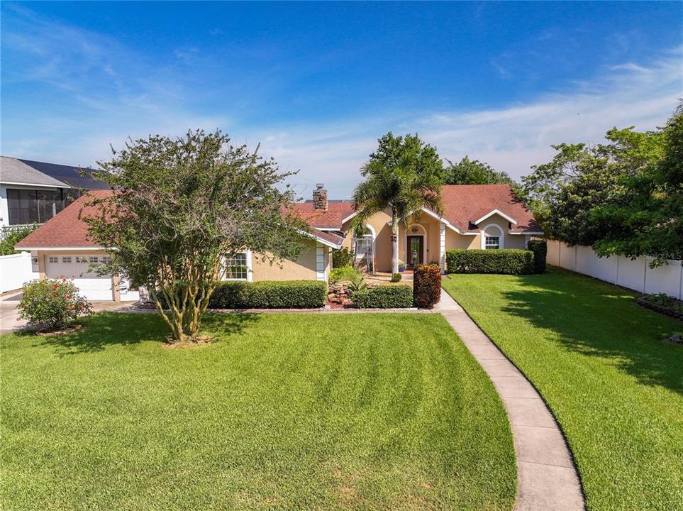 The property has vinyl privacy fencing on each side and the front has a gated entrance (with remote access)