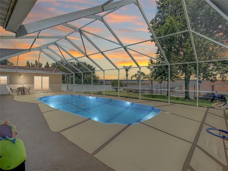You will enjoy amazing sunsets from your 26' x 53' screened pool cage.