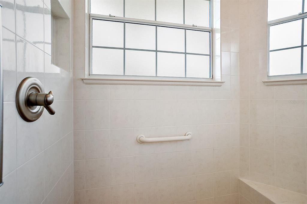 En suite with Tiled walk in shower
