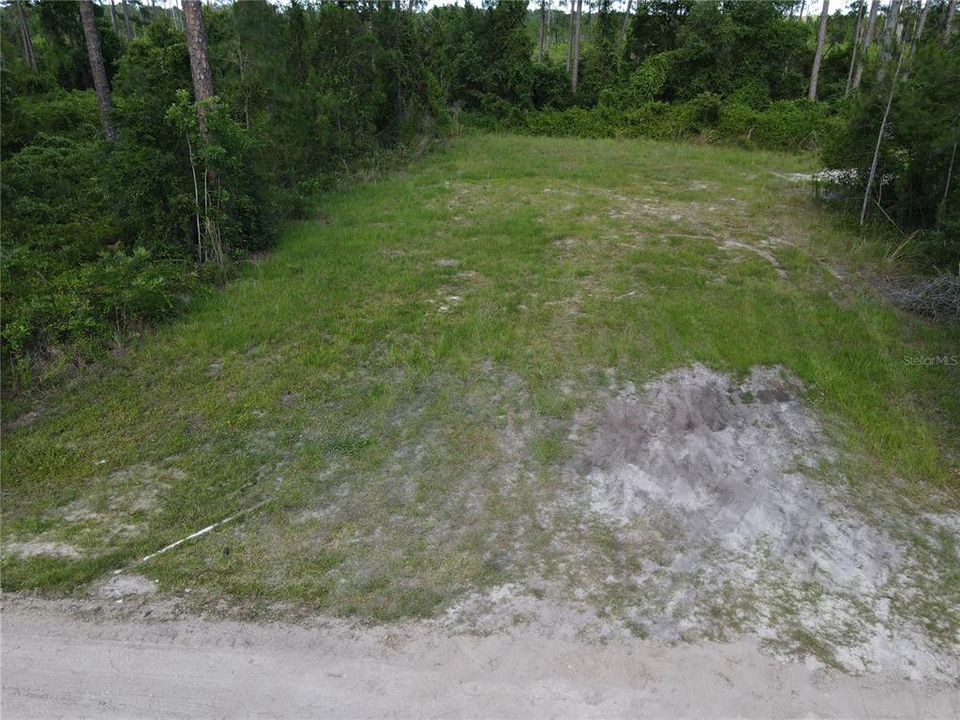 This .26 acre parcel is cleared. Seller indicates that fill has been added.