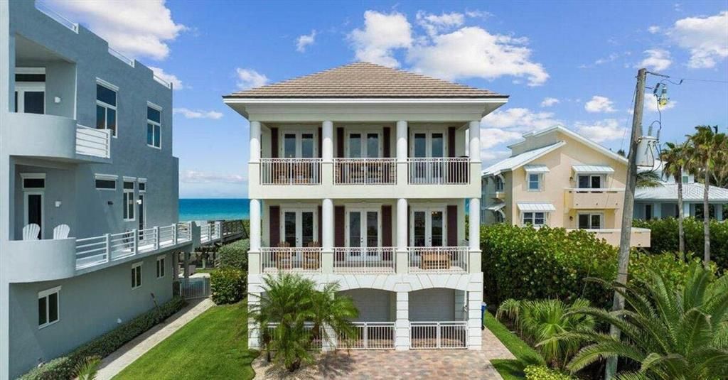 Front - RiversideWelcome to Vero Beach ~ your Ocean to River Oasis awaits! Offering a pool, elevator and a deep water dock over the Indian River, this fully furnished home is great for a primary residence, seasonal home or investment opportunity.