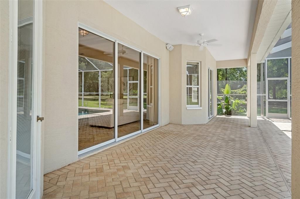 Brick paved covered screened Lanai