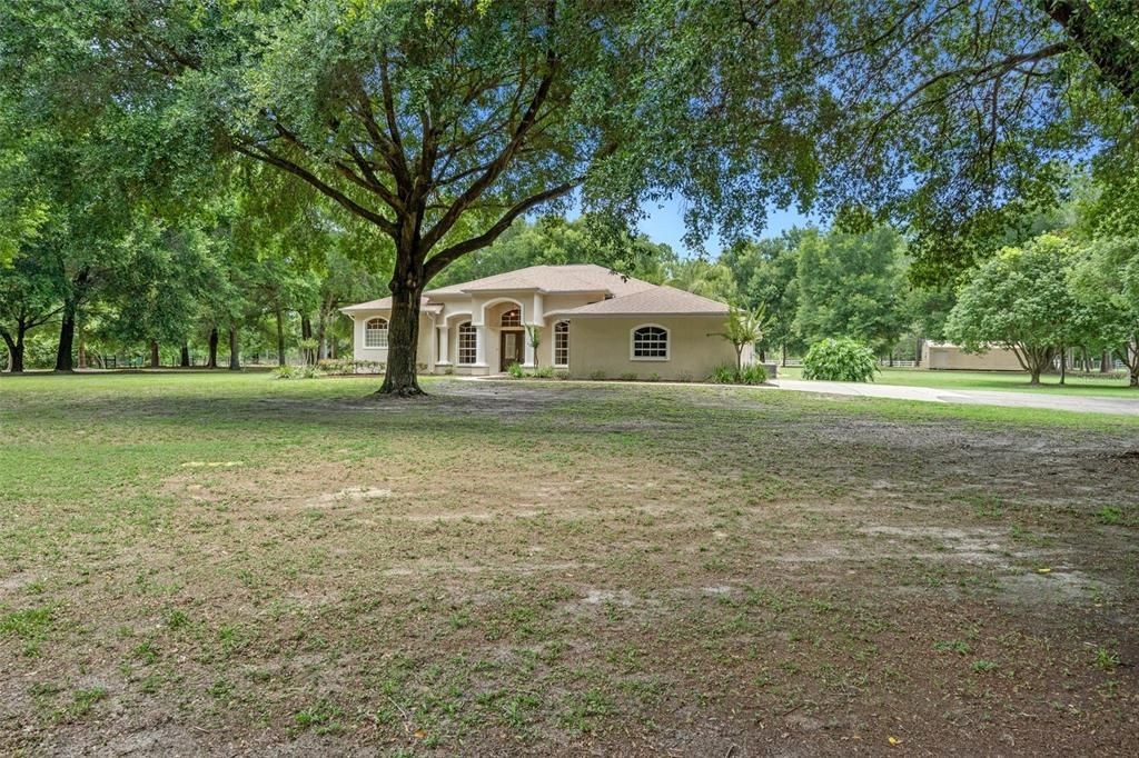 Front of home from paved circle drive