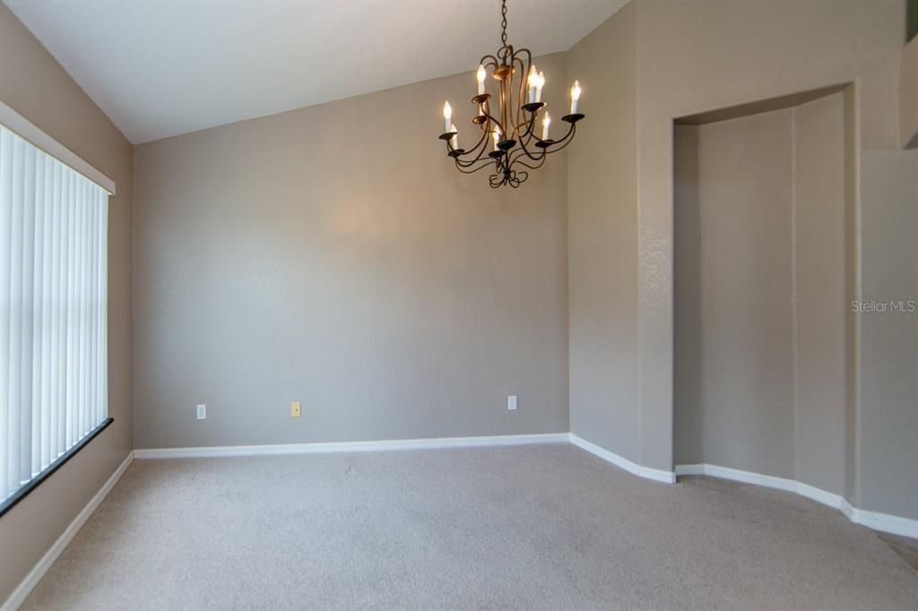 Formal Dining Room with Vaulted Ceilings