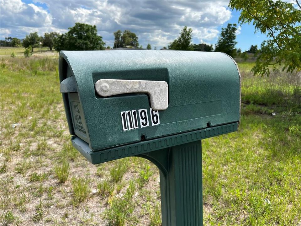 14. Mailbox on the same side of the property (belongs to neighbor across the street)