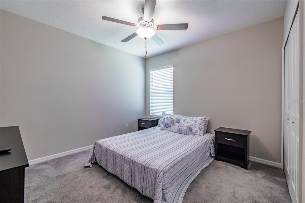 The 11'x12' guest room is large enough for any sized bed. This one is queen size.