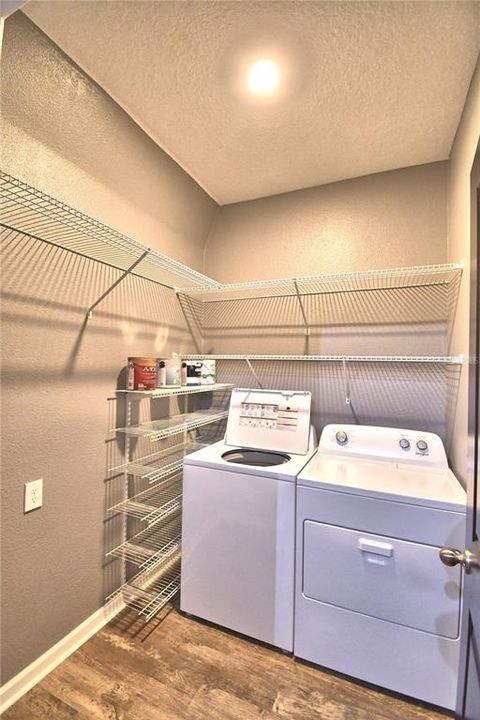Large inside laundry room with room for freezer