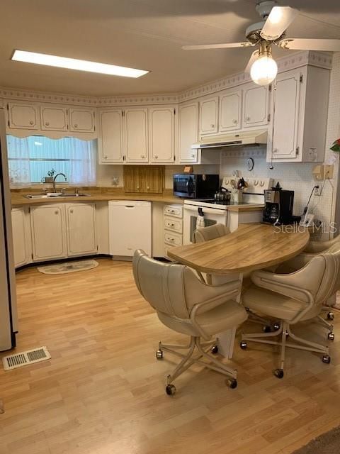 Kitchen with view of eat-in area