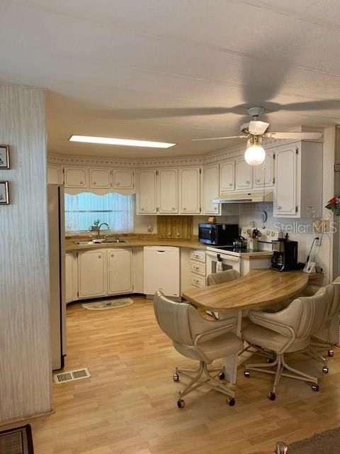 Kitchen area looking from the Dining area