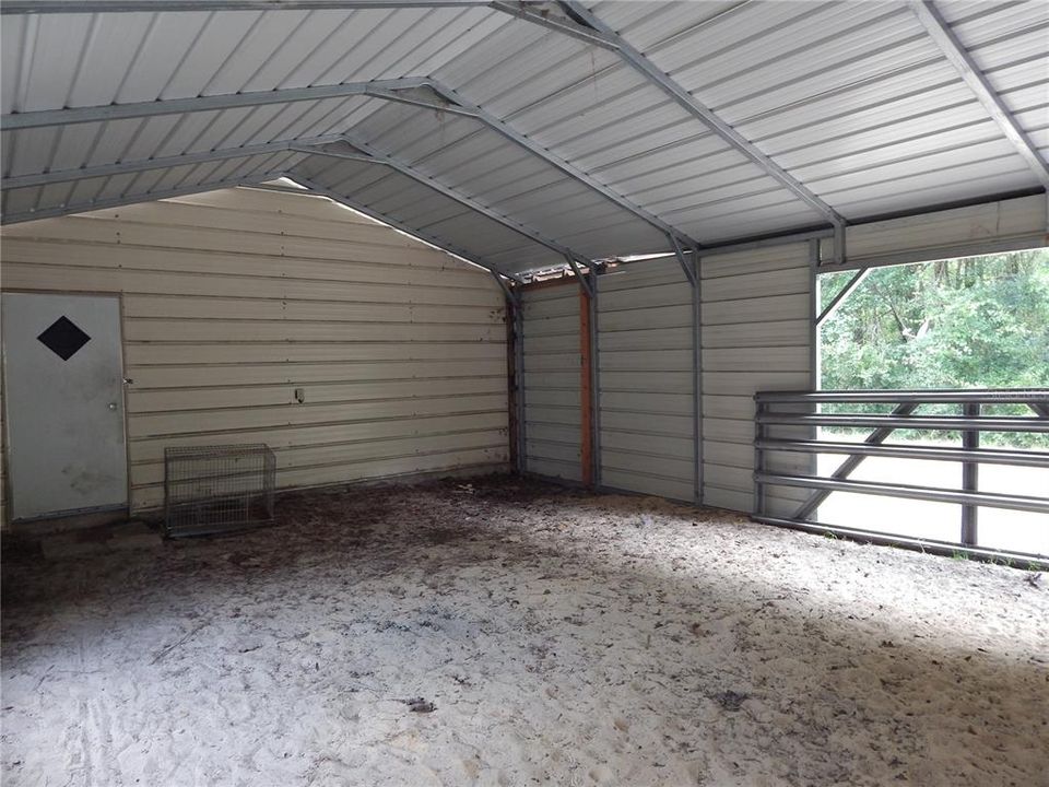 Enclosed Carport/ Storage Area
