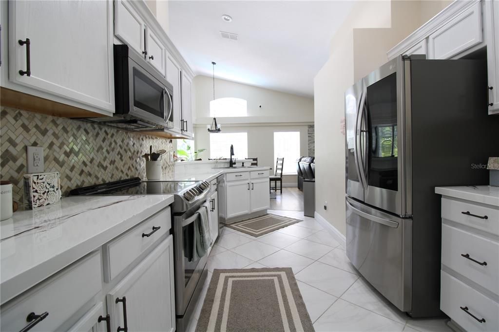 Bright, open kitchen with upgraded appliances