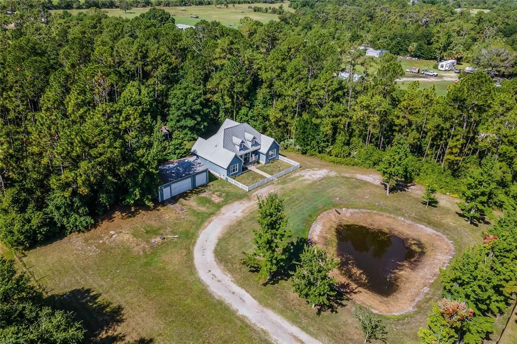 There is a small POND in the front that adds to the charm this property has in spades!