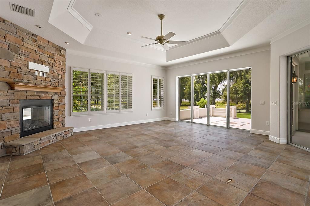 Large family room with tile flooring