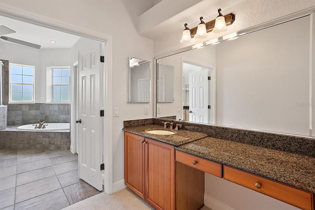 En suite with huge vanity dual vanities