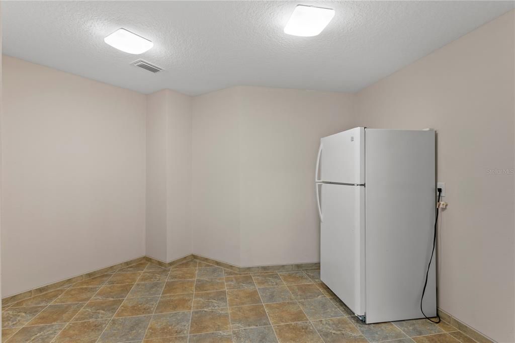 Large Walk-In Pantry on hallway to garage