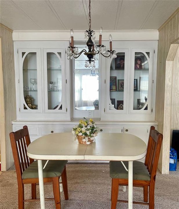 Spacious built in cabinets in dining area