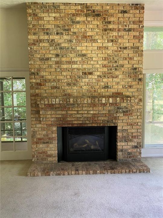 Flooring to ceiling fireplace