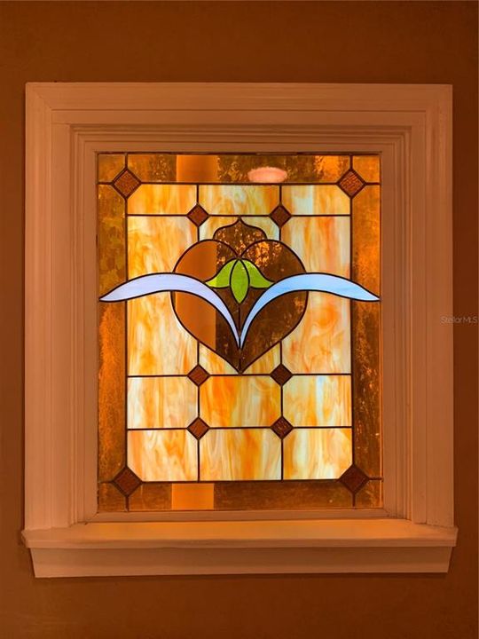 Original Stained Glass Window in the Primary En Suite Bathroom