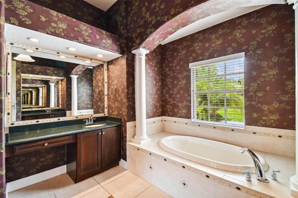 Garden tub in primary suite.