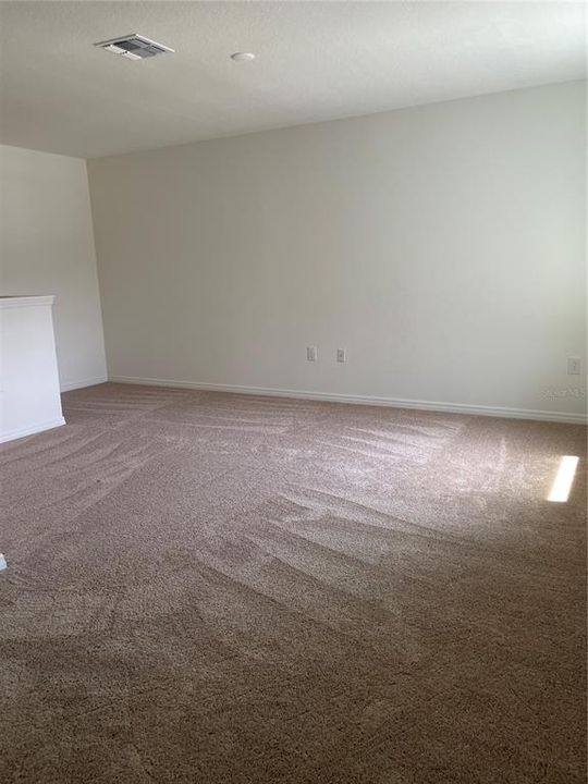 Enlarge game or family  room upstairs