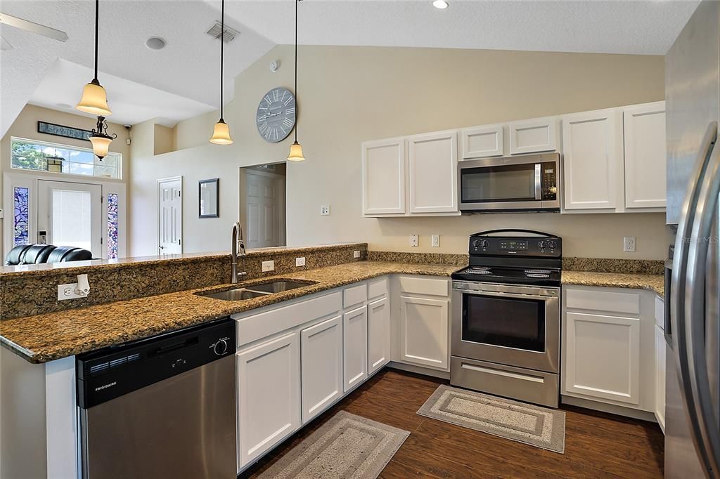 Kitchen with Granite Countertops and Breakfast Bar Area