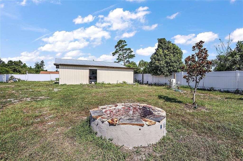 Backyard with Detached Barn and Firepit Area