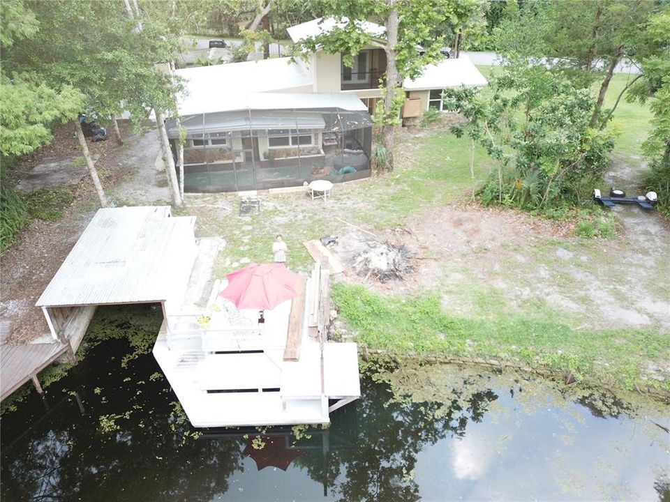 Back yard, boat house and fishing dock