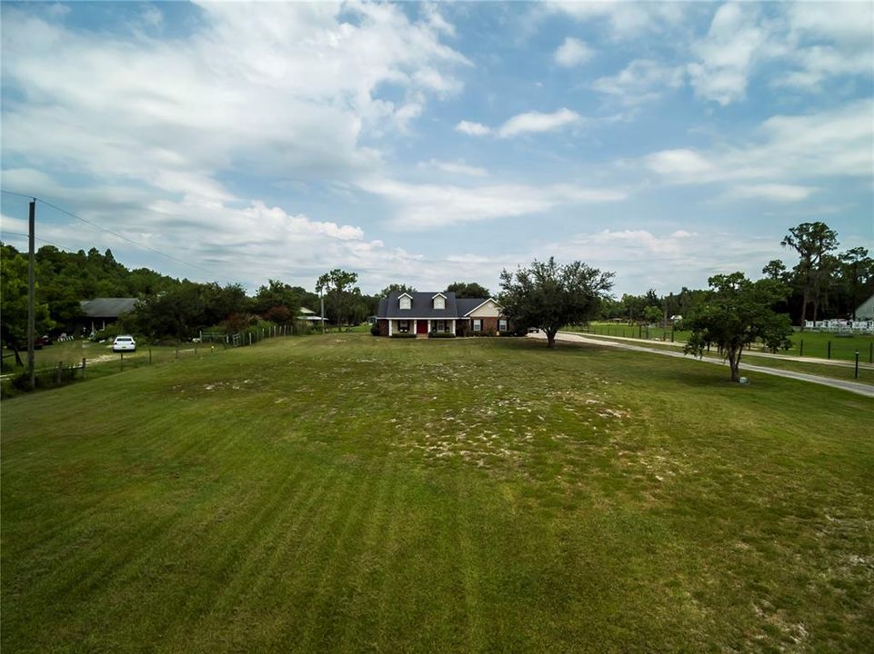 Aerial Front View with Long Driveway