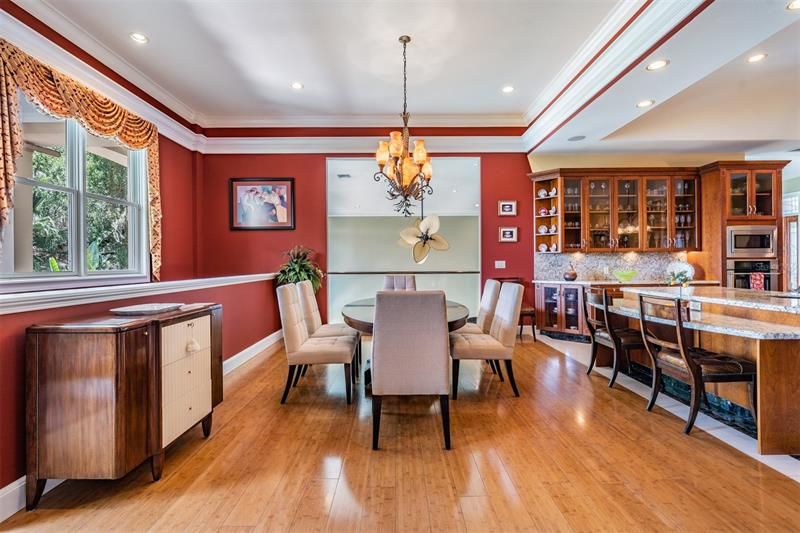 Dining room overlooks lower level and lake