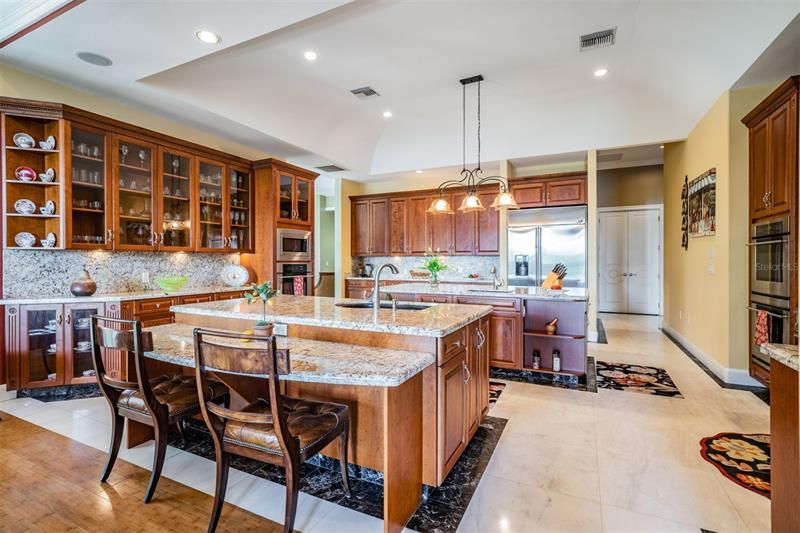 Gleaming granite tops, marble floors in gourmet kitchen!