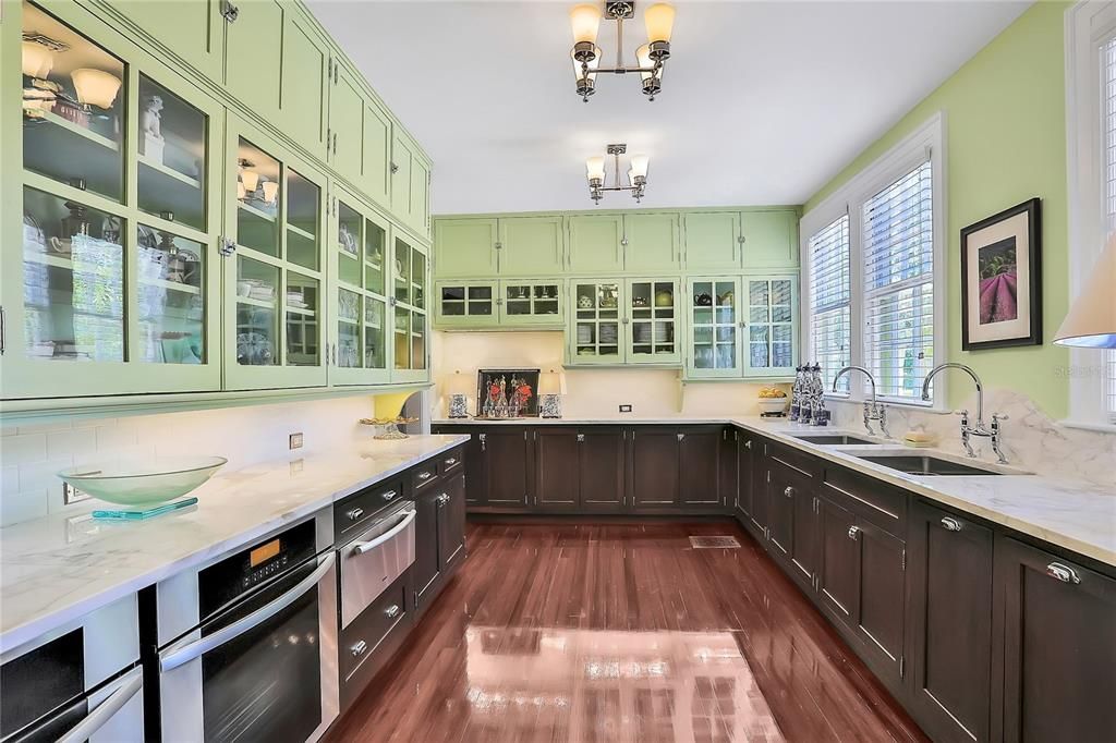 Butlers pantry complete with double Meile ovens, warming drawer,double sinks and wine refrigerator..