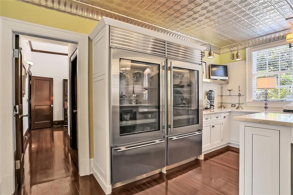 Butlers pantry complete with double Meile ovens, warming drawer,double sinks and wine refrigerator..