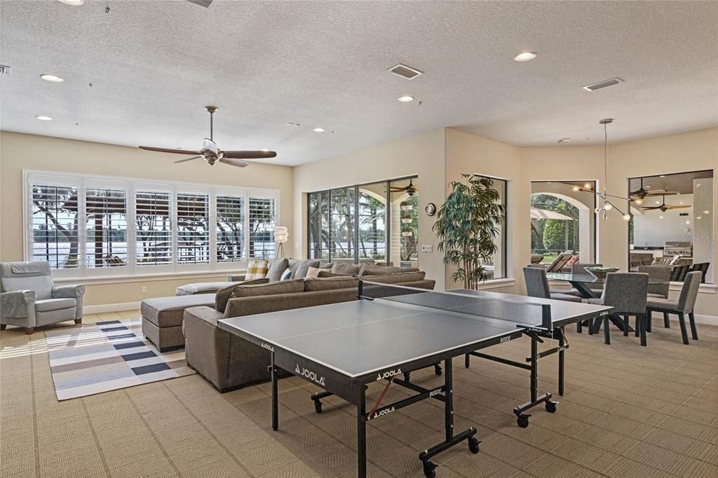 Lower level family/game room has sliders to outdoor entertaining areas