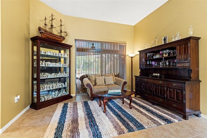 View of the living room with bright natural light from tall sliding glass doors