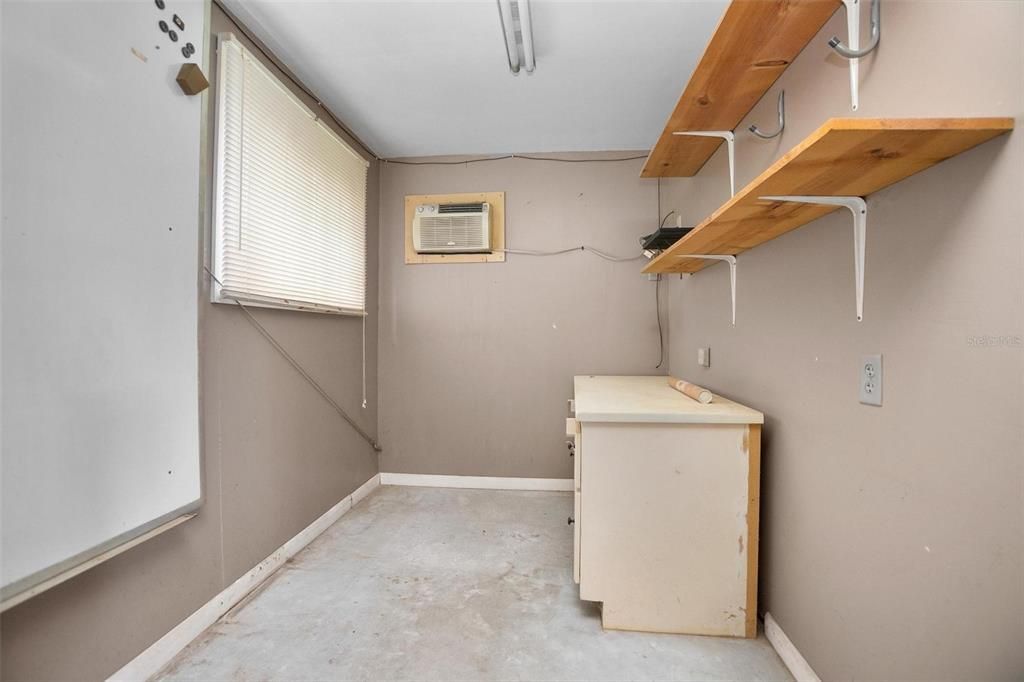 office in RV garage with separate window unit