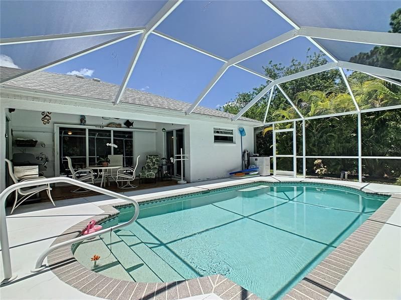Your Private Pool awaits you. Nice covered Lanai for sitting and enjoying life in Paradise. Lanai has a tiled floor and there are sliding doors to the living room, dining room and master bedroom