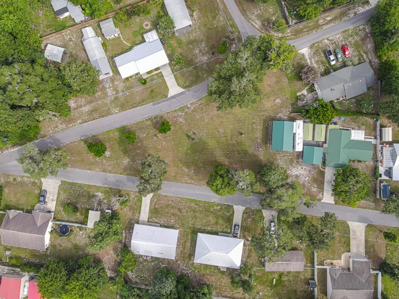 Aerial view showing extra lots that are for sales with purchase of the home.