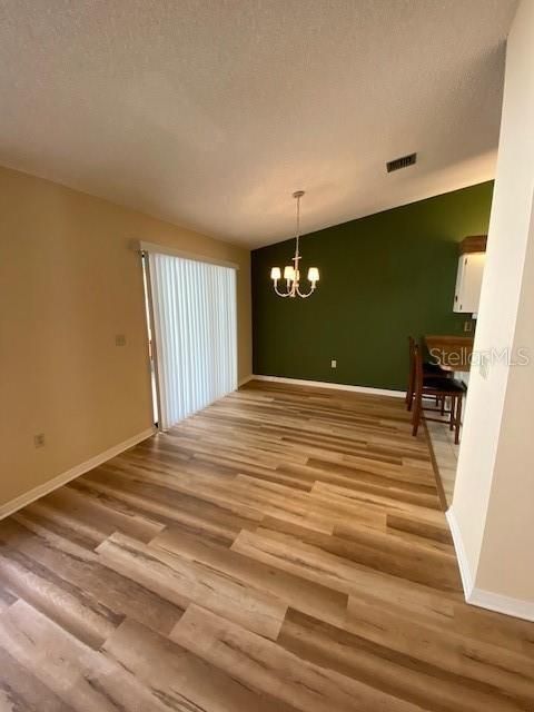 Dining area with sliding doors to screened porch