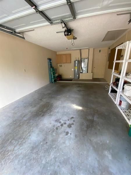 Garage with laundry area in back