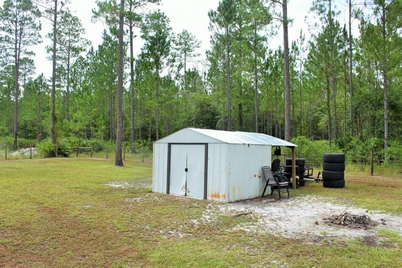 Back yard shed in rear