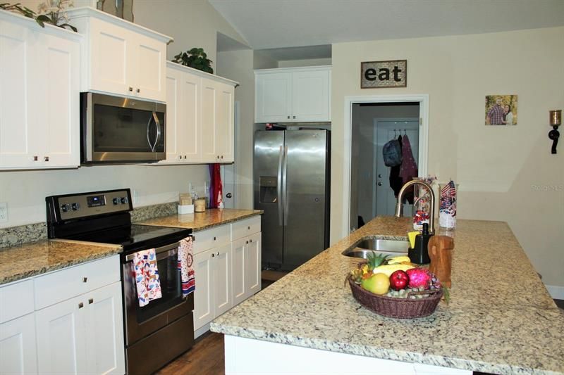 Kitchen and doorway to laundry room and garage