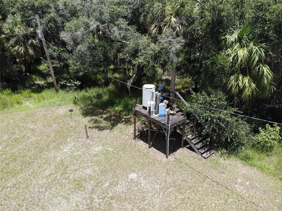 Elevated well pump and water system.