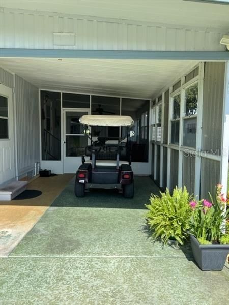 Covered carport and side screened in porch