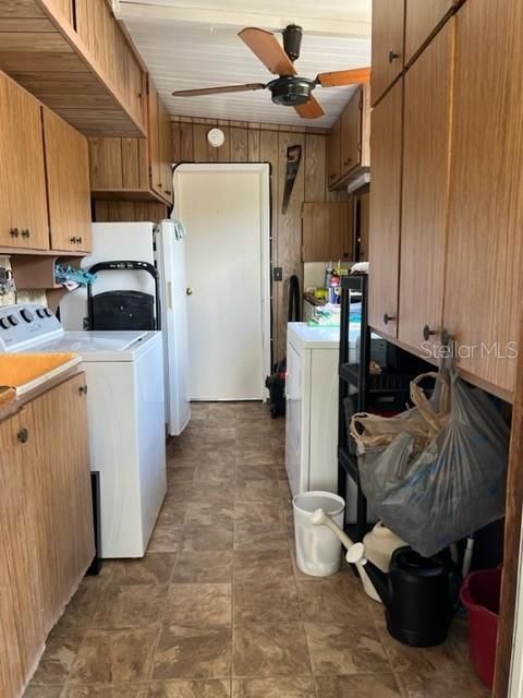 Utility and laundry area with washer and dryer and laundry sink