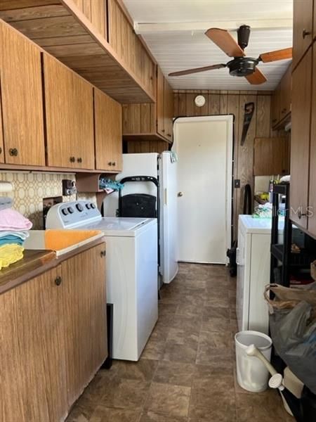 Another view of Utility Room and laundry area. Door leads to Back Florida Room