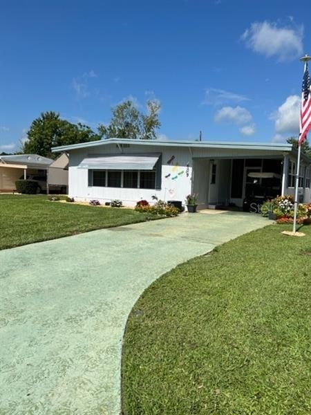 Front of property. Lots of new landscaping