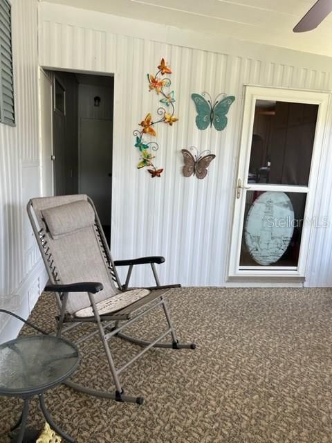 Screened in porch, with door to outside, door to laundry area and on left extra storage