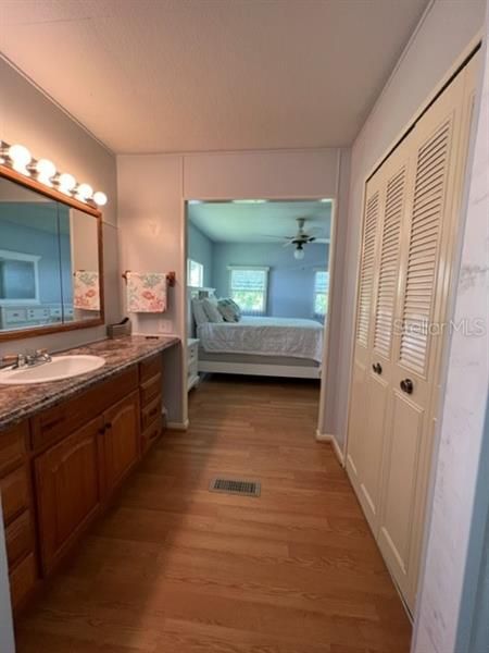 View from Shower area through to Master Bath dressing area and Master Bedroom